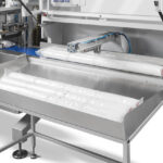 Horizontale Schlauchbeutelmaschine Gemini Int von KOPP Verpackungssysteme - Detailfoto Special Outfeed
